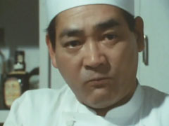 Commander Gonpachi Edogawa as cook and manager of Snack Gon